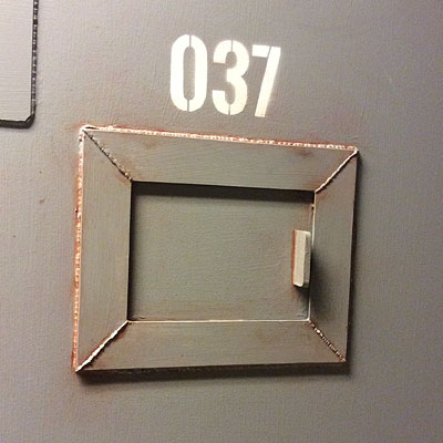 <b>Gåsmamman 1 scenography</b><br>Prison door detail<br>